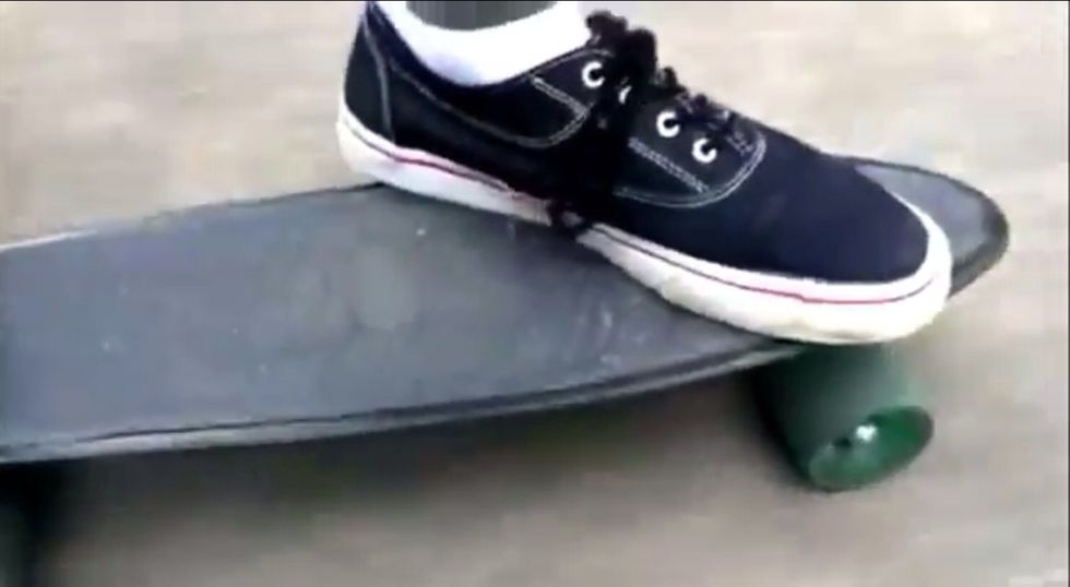 Sorry for the blur (I moved my cam around a lot) step on ur skate board and place both feet on your skate bored equally apart to balance\u27a1