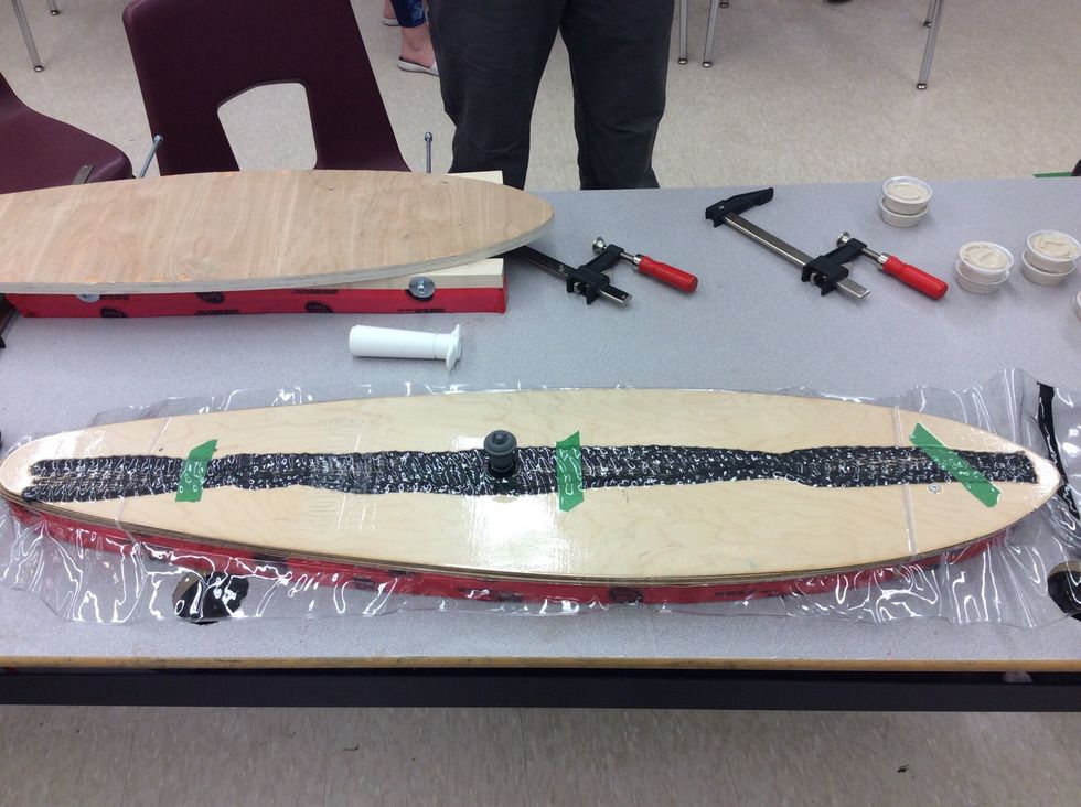 Sorry for the leap but I lost some pics but this is after you apply glue to all layers but glue both sides of the middle layers and 1 side of the outer layers then after it drys slide it in the bag