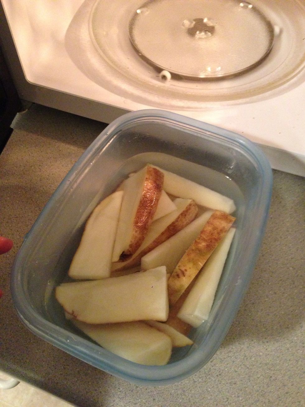 Sorry I didn't show you the cutting step, but cut the potatoes in wedges and put in a bowl of water, chicken broth, or vegetable broth.
