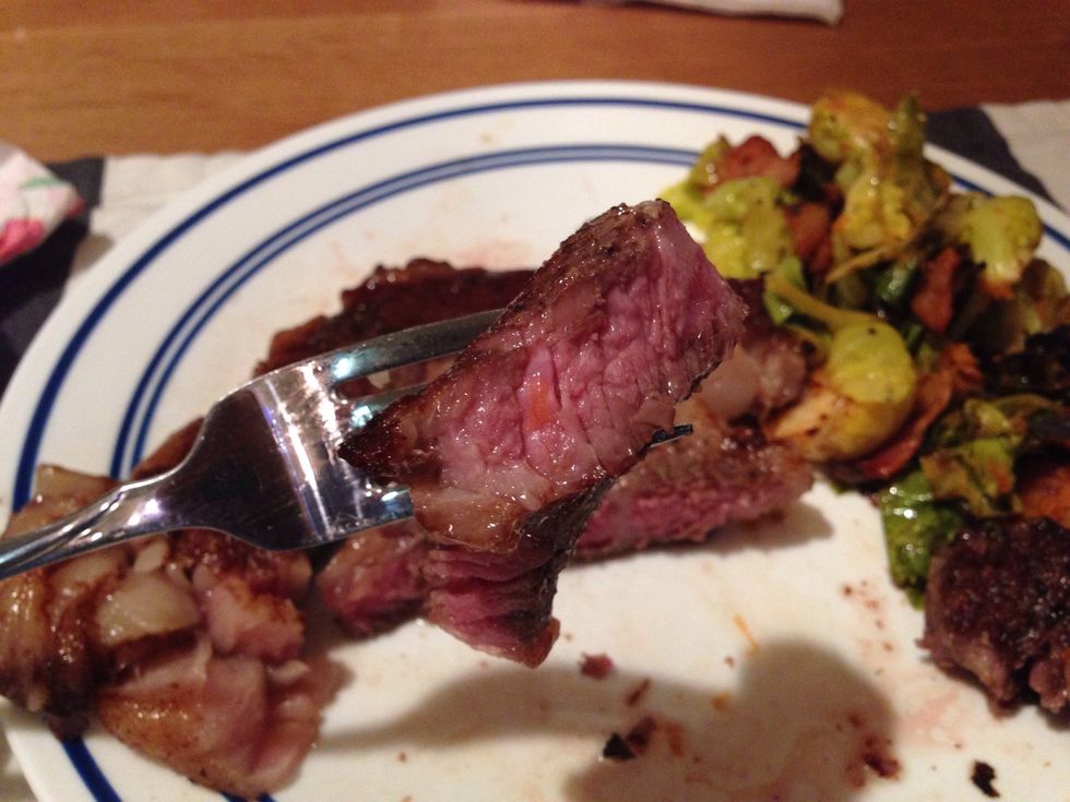 Sous vide steak, because of vacuum sealing, almost comes out greenish brown at first. Fork tender regardless.