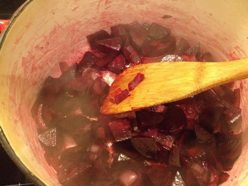 Speaking of beetroot, let's give the pot another stir. The is beetroot starting to soften and emit it's juices, and the pot is turning pink!