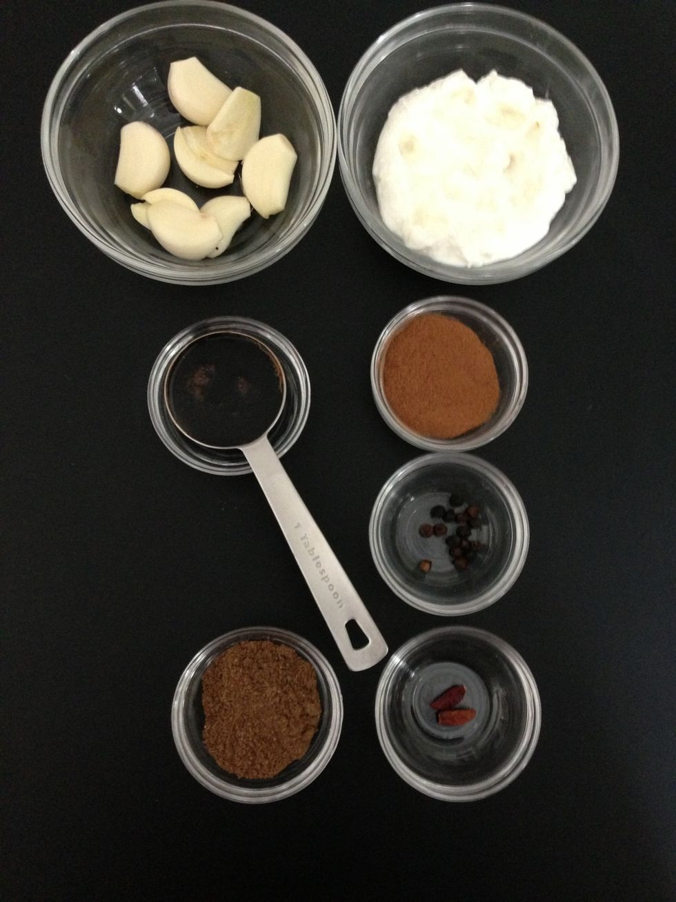 Spices and condiments seven spices, cinnamon , chili, sour pomegranate syrup (u can do without that)  black pepper, and yogurt.