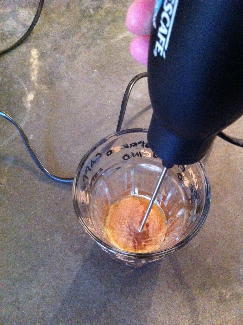 Spin the coffee and water until it's fluffy