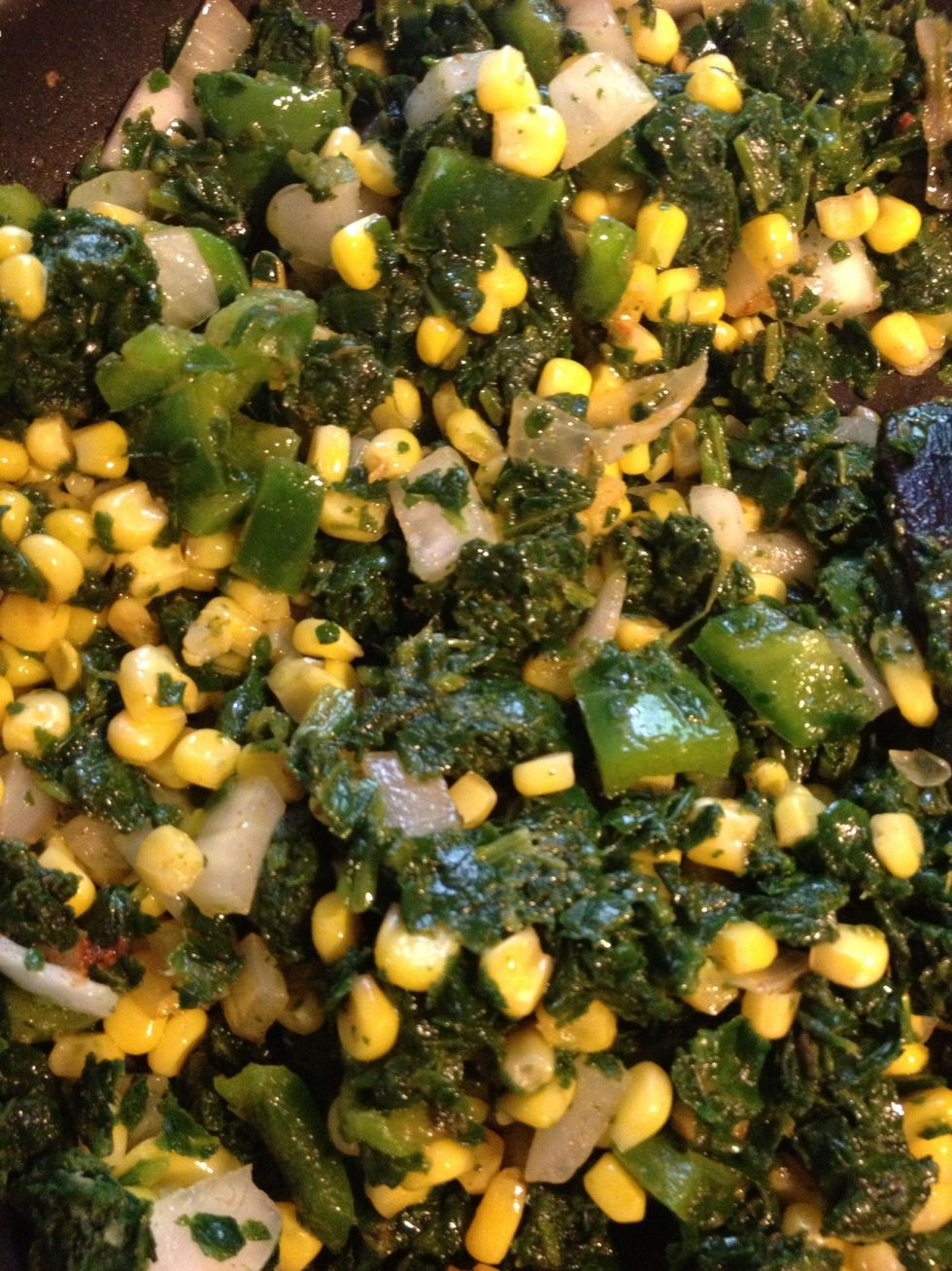 Spinach, corn, and peppers. You can add anything you like even chicken I kept mine simple veggie style