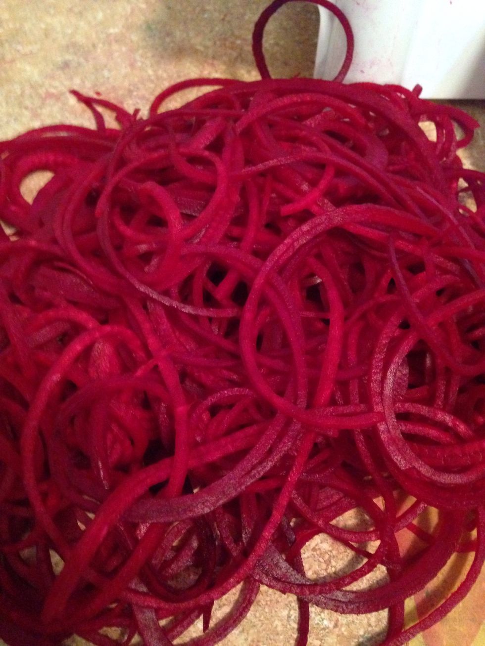 Spiralize a beet to make the beet noodles.