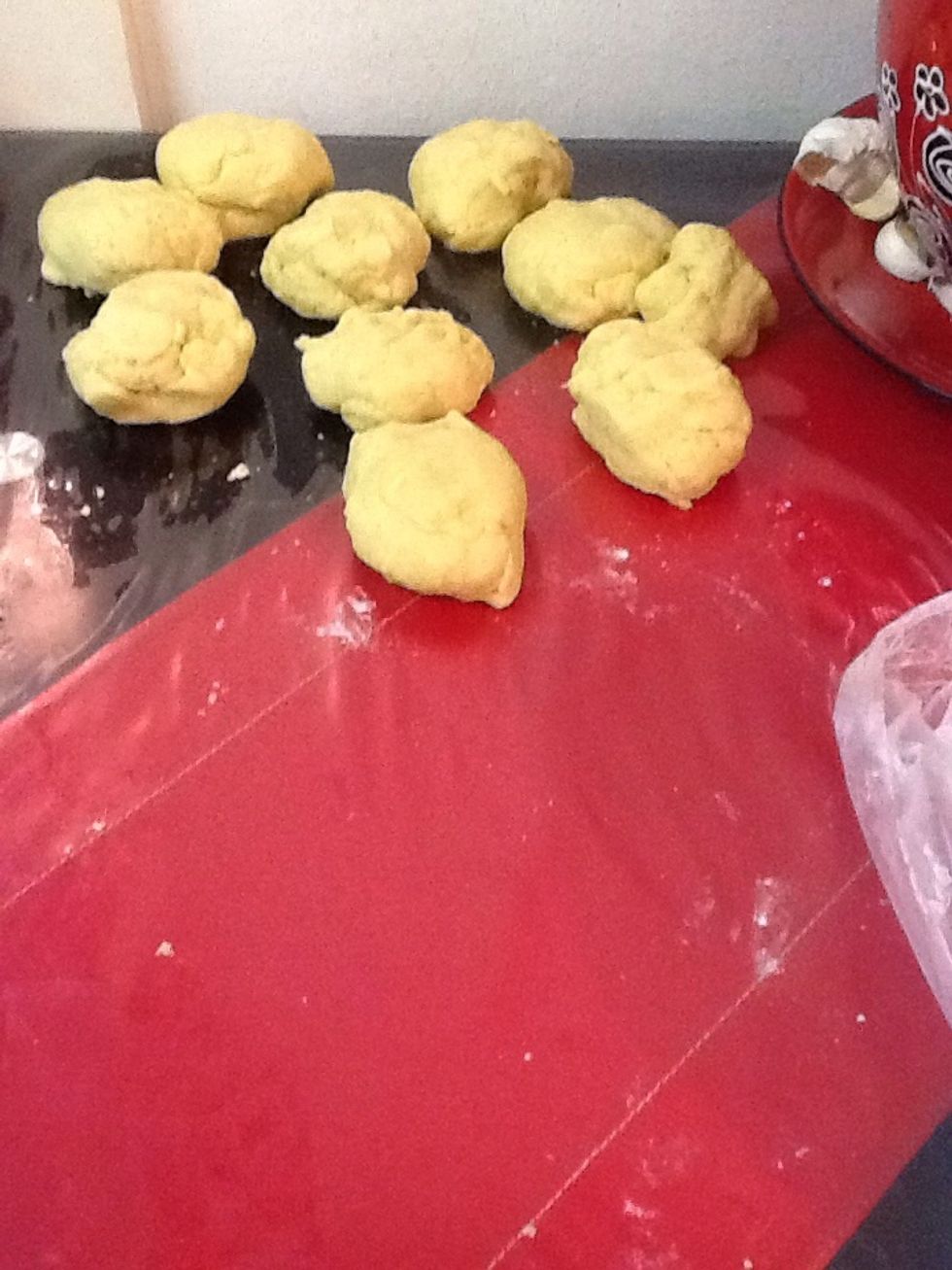 Split and roll the dough into mini balls