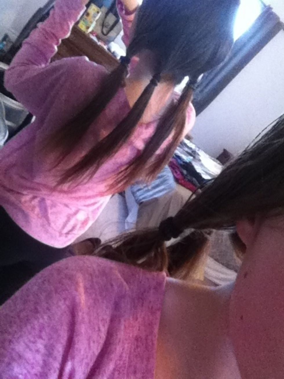 Split hair into 4 separate parts. Make sure that they are more or less even