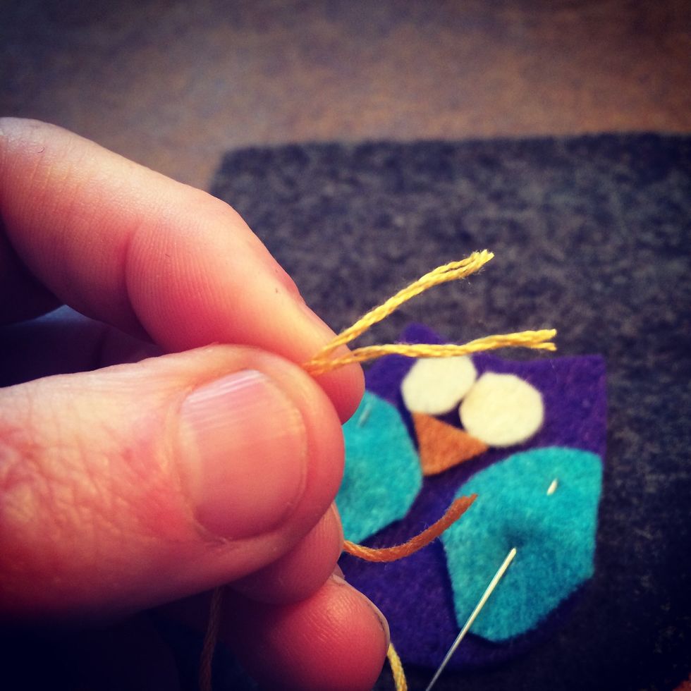 Split the embroidery floss into 3 threads - do not use the full 6 threads. Next thread your embroidery needle and your ready to stitch together your owl.