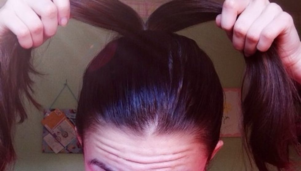 Split the ponytail into two sections