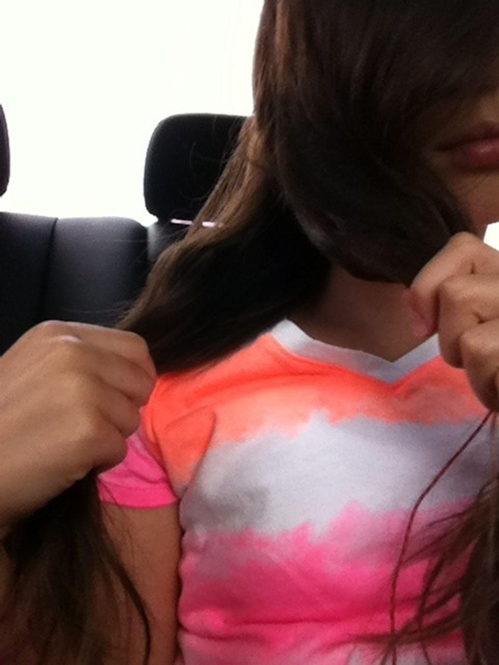 Split your hair into 2 parts.