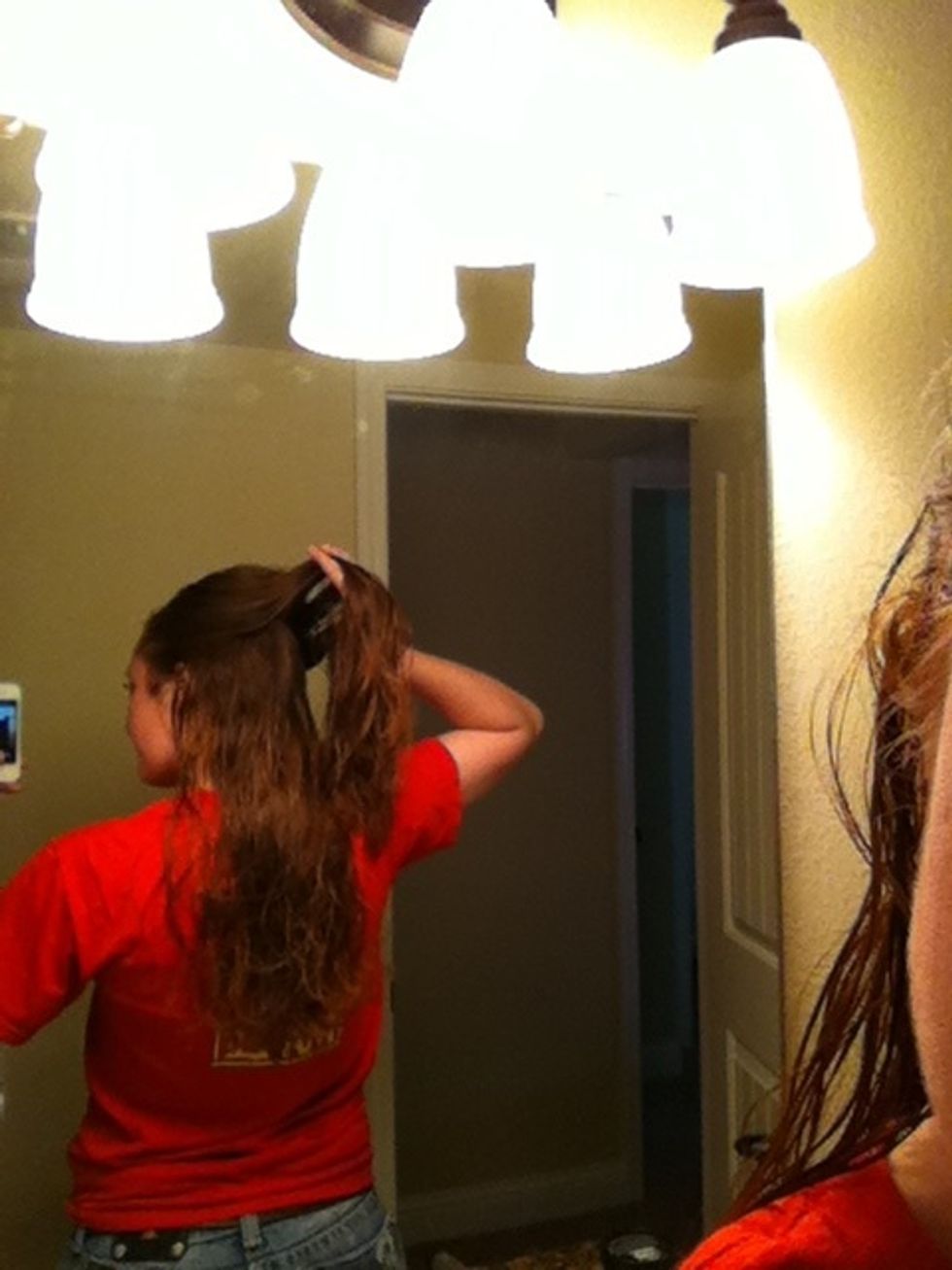 Split your hair into three equal parts you can start higher on your head but I like the braid to start about half way down my head.
