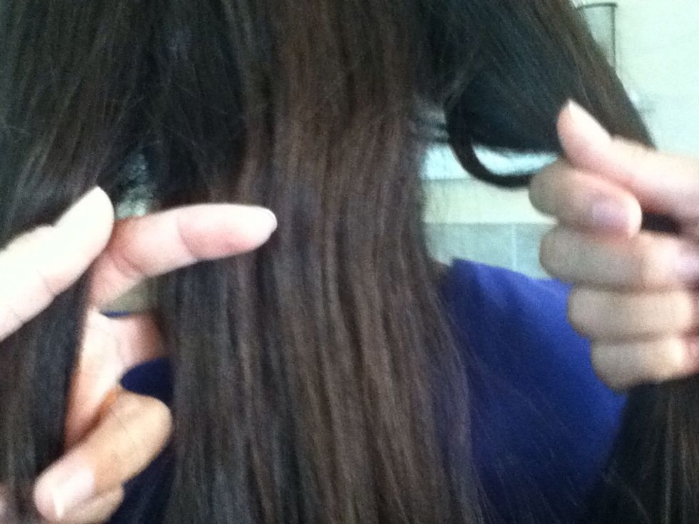 Split your hair into three strands.