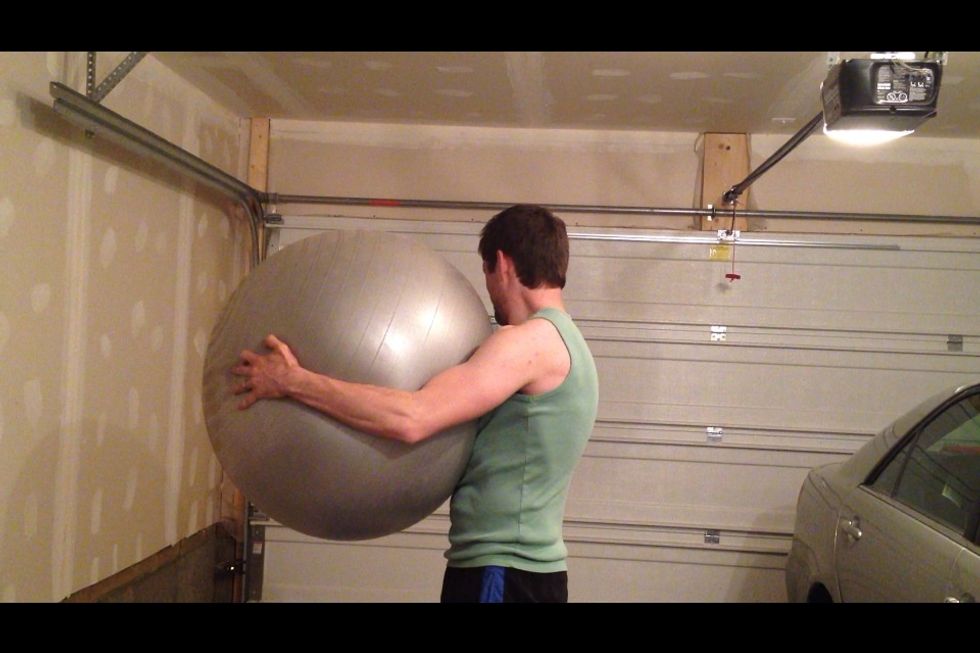 Splitting the atom: Compress the ball, forcing your forearms together. Hold for 2 seconds, release. Repeat 10-15 times.