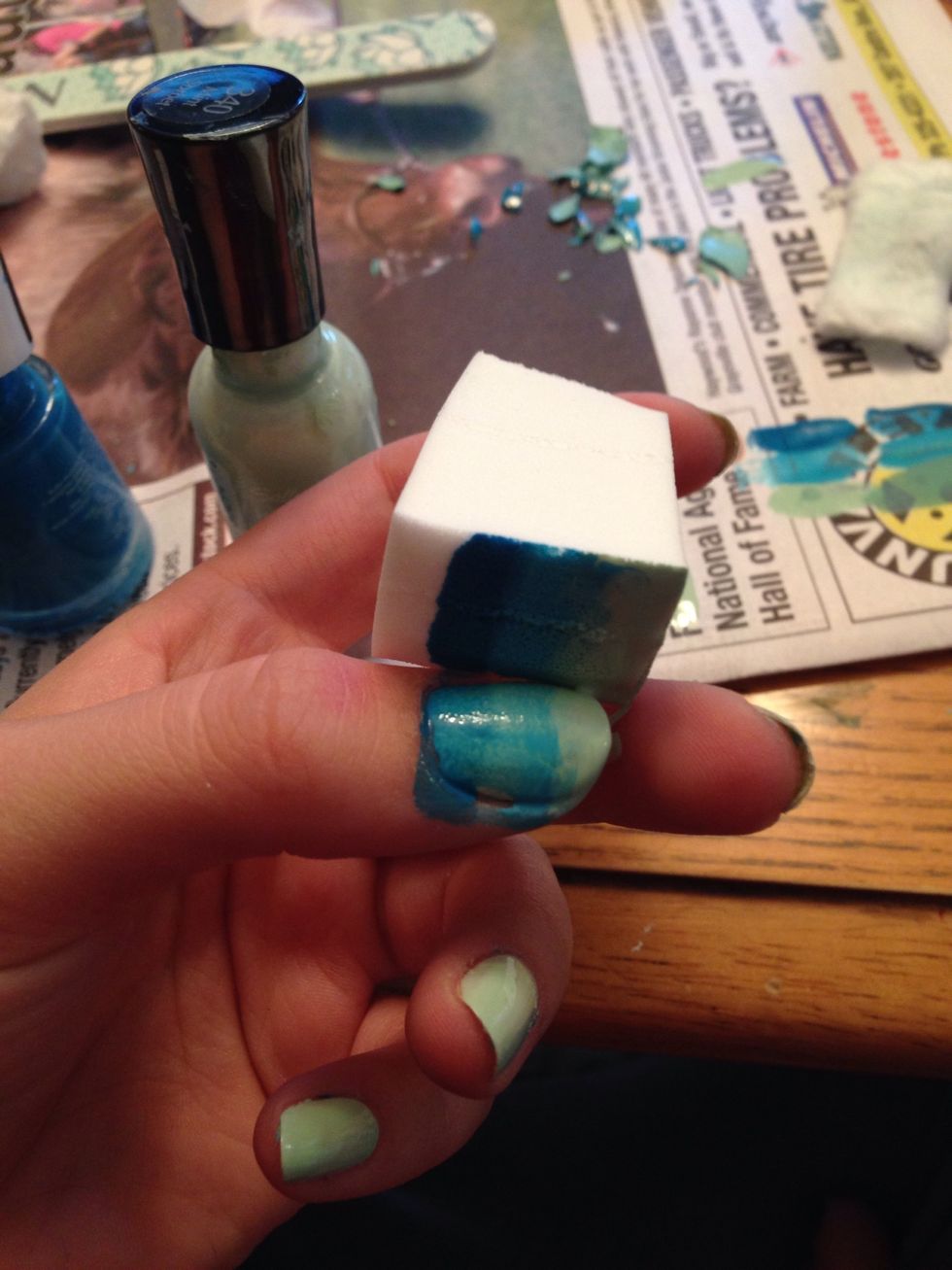sponge it on your nails kind of smudging it