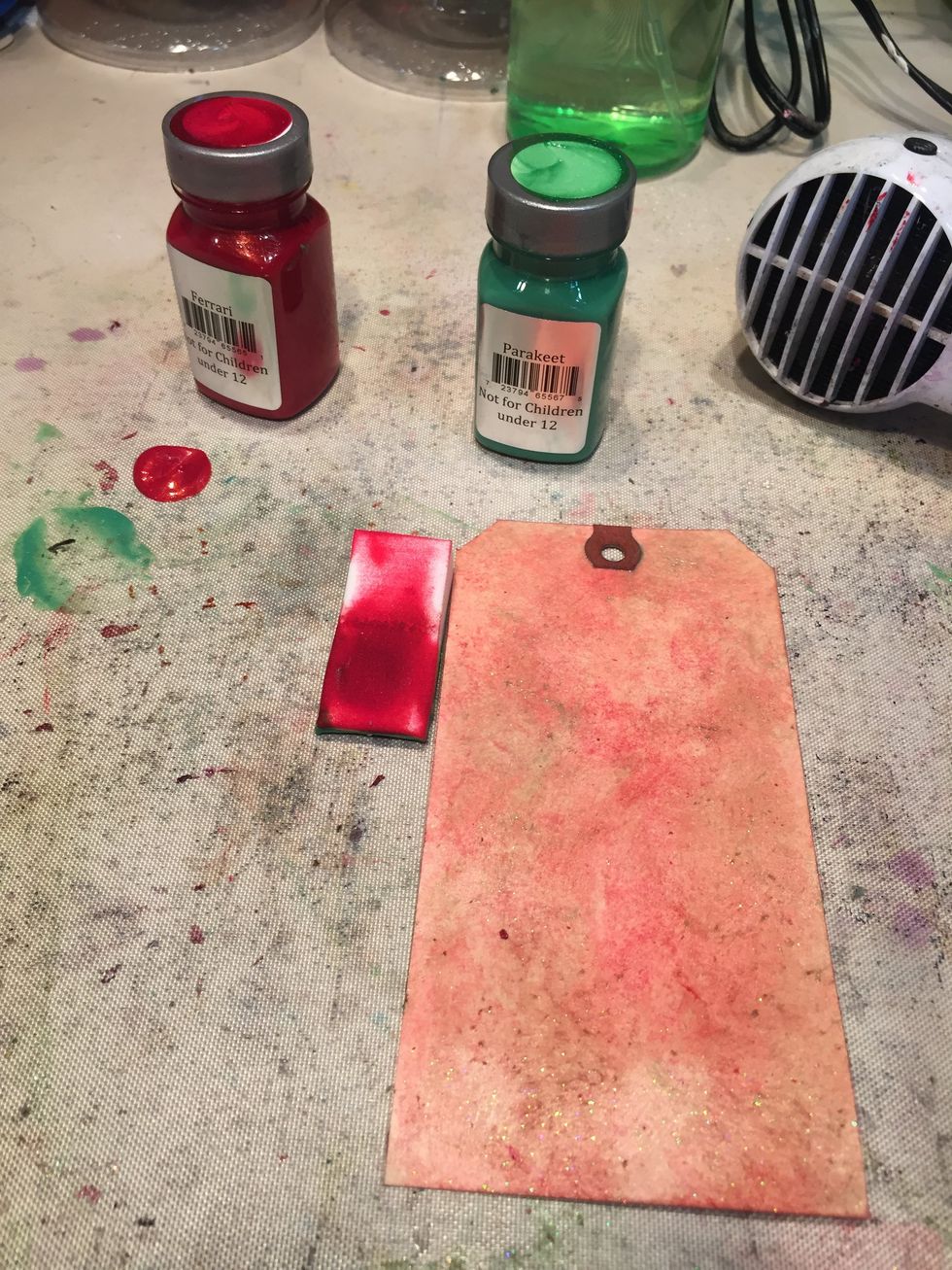 Sponge on several coats of each color, blending and drying in between applications.