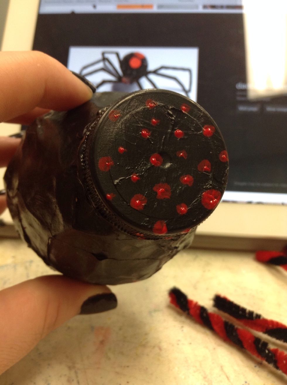 Spooky eye dots with a paint brush!