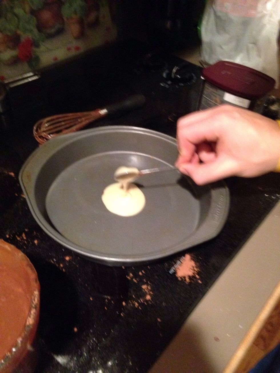 Spoon 3 tablespoons of vanilla batter into the center of the cake pan