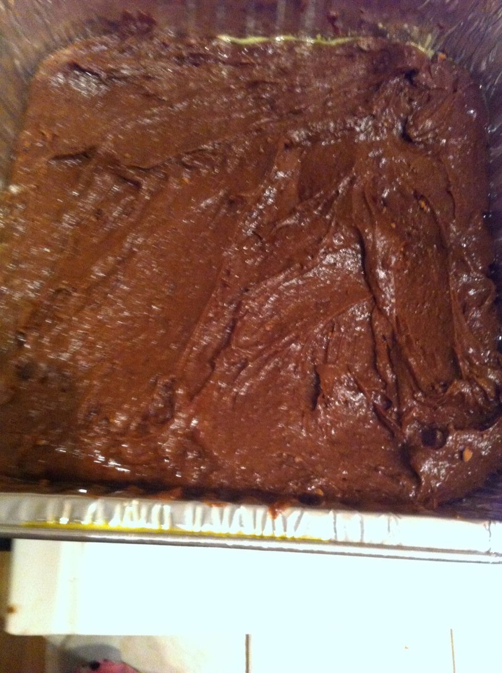 Spoon and spread half the batter in your prepared pan