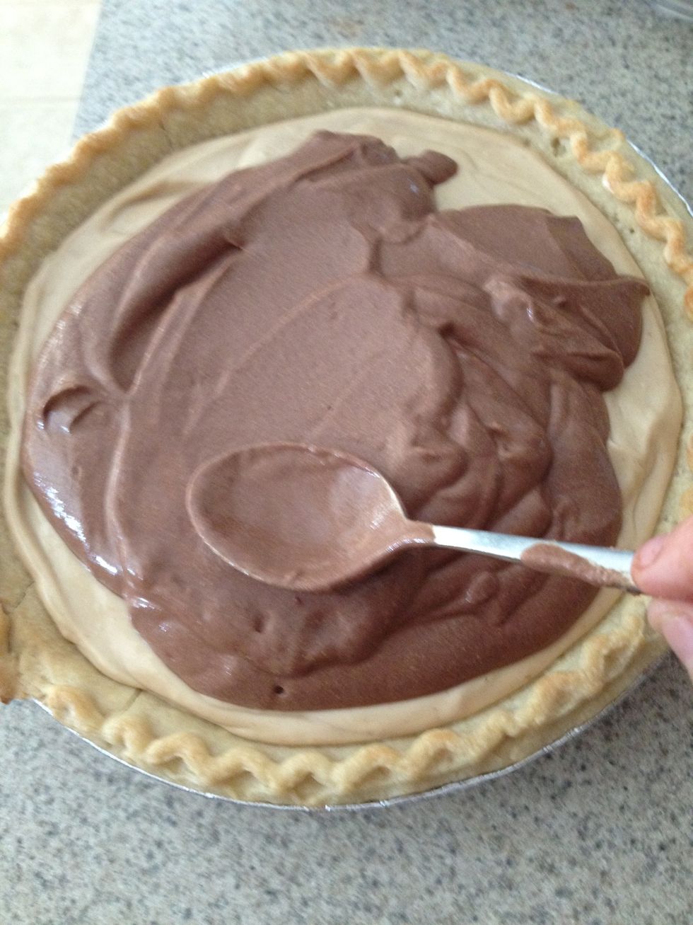 Spoon and spread over the peanut butter layer.