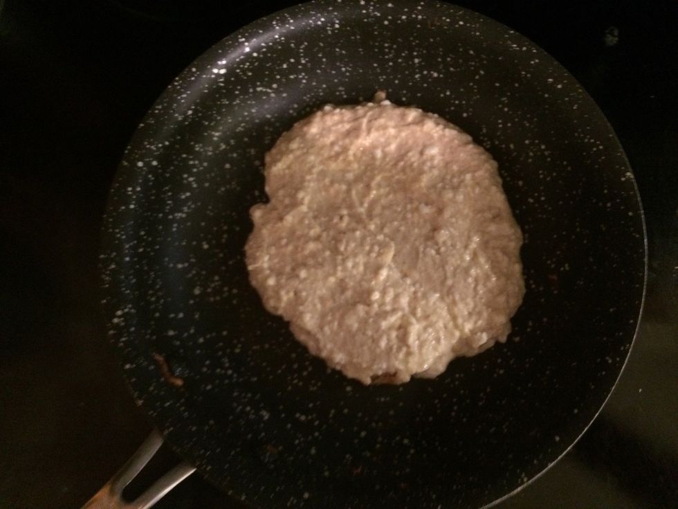 Spoon batter onto pan and cook until bubbles appear.