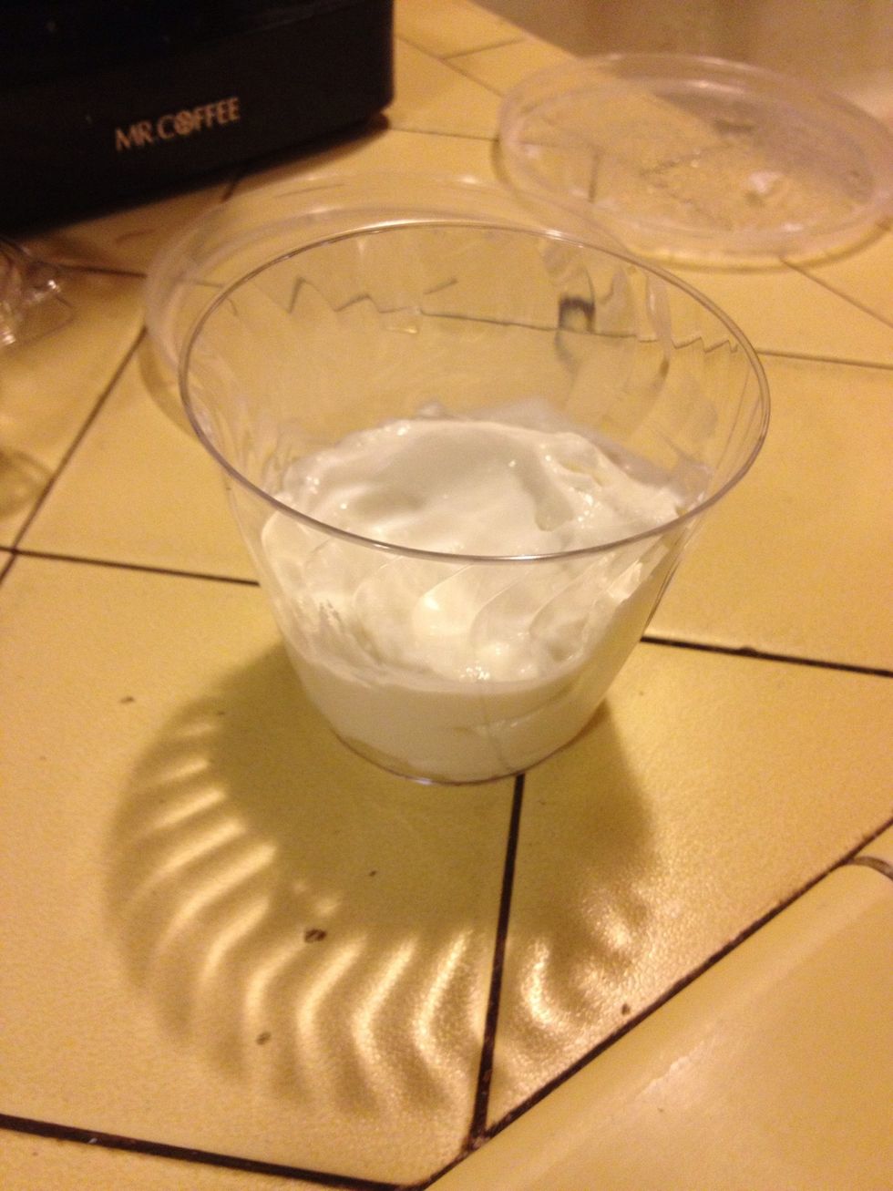 Spoon into a cup about 3/4 of the sweetened yogurt.