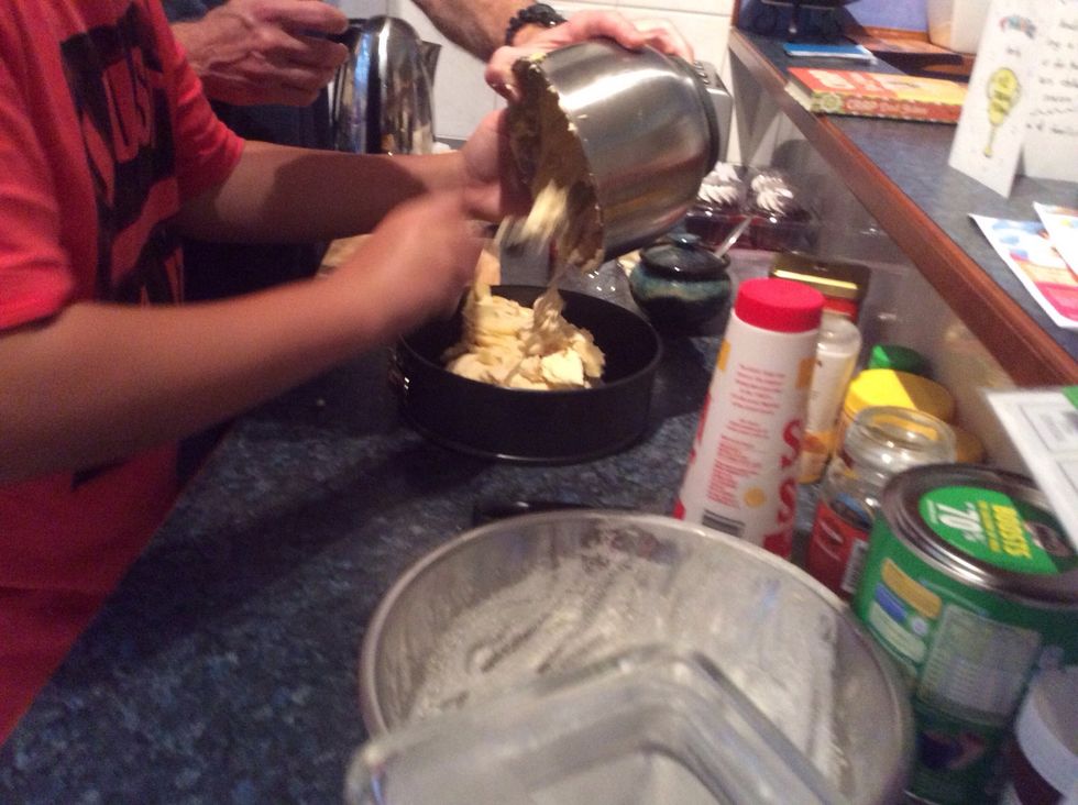 Spoon mixture into prepared tin. Sprinkle with flaked almonds over the top.