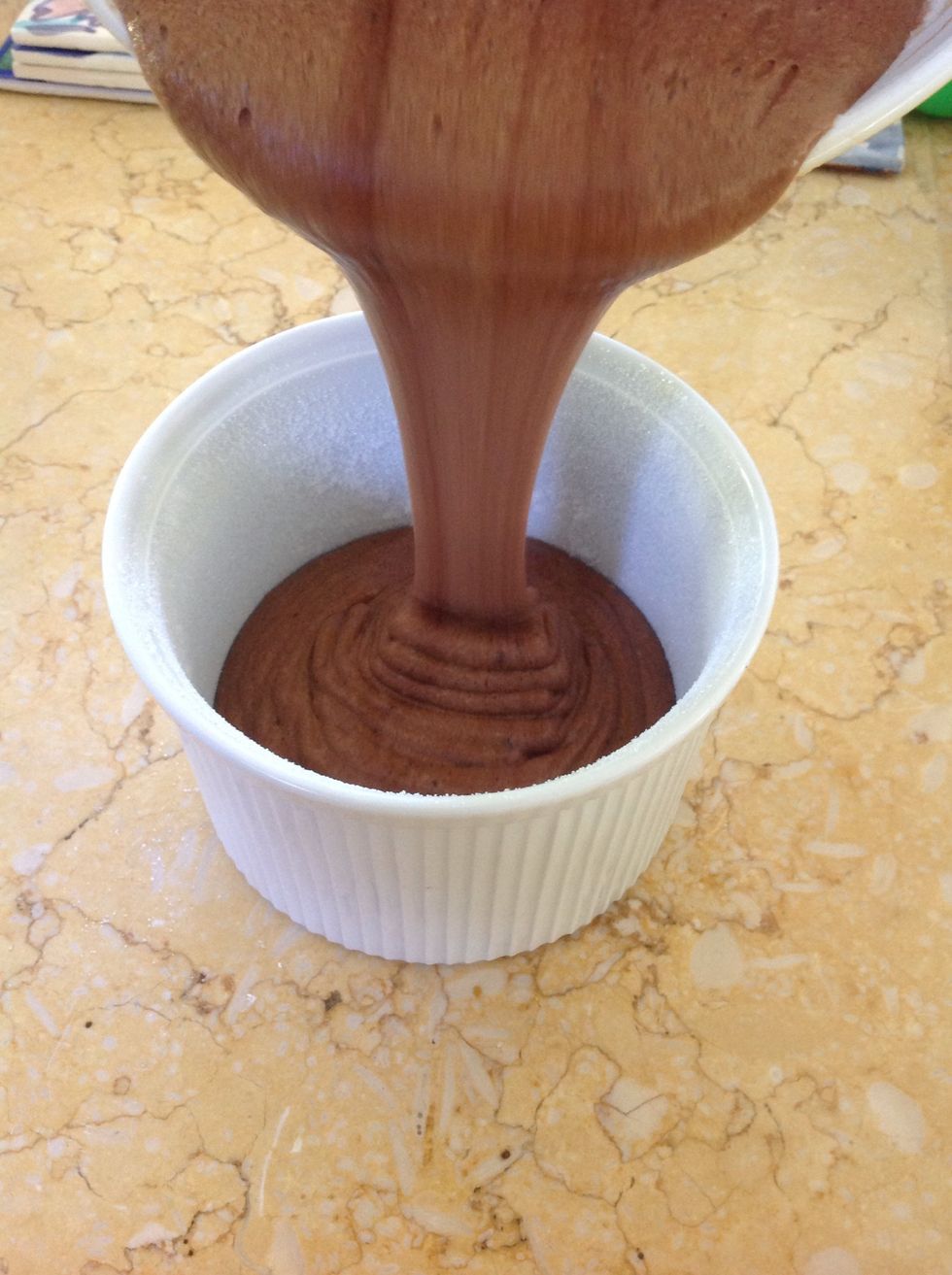 Spoon or pour into the prepared souffl\u00e9 dish until 5/6 full.