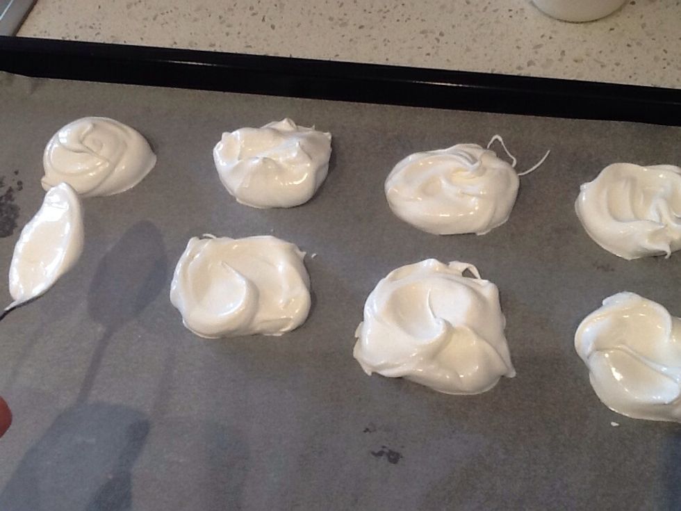 Spoon out mixture and each on should be about a dessert spoon size. Cook for 1 1/2 hours or until meringues are crisp.