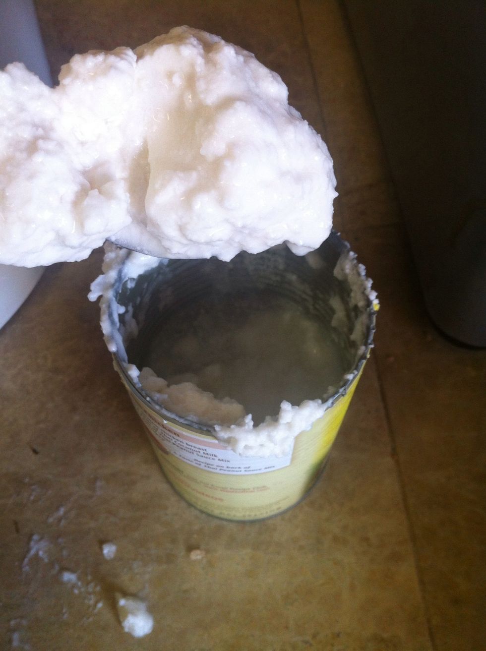 Spoon out white solid....