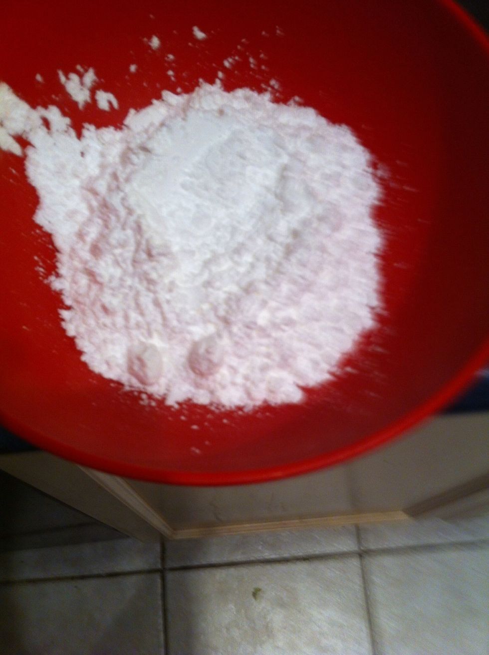Spoon powdered sugar into a bowl and add milk or water a little at a time until just slightly drizzly.
