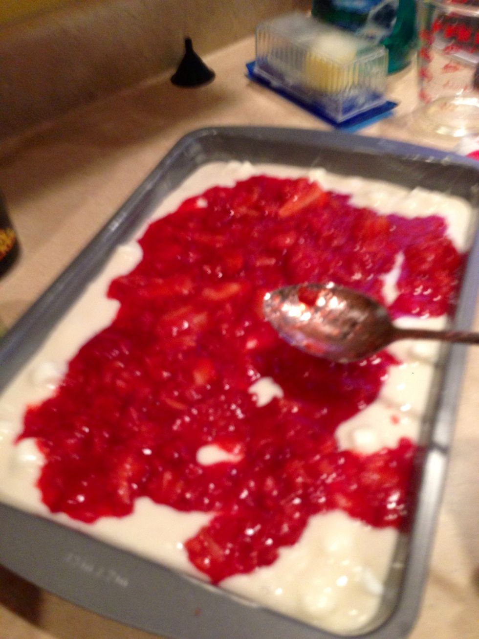 Spoon strawberry mixture evenly over cake batter
