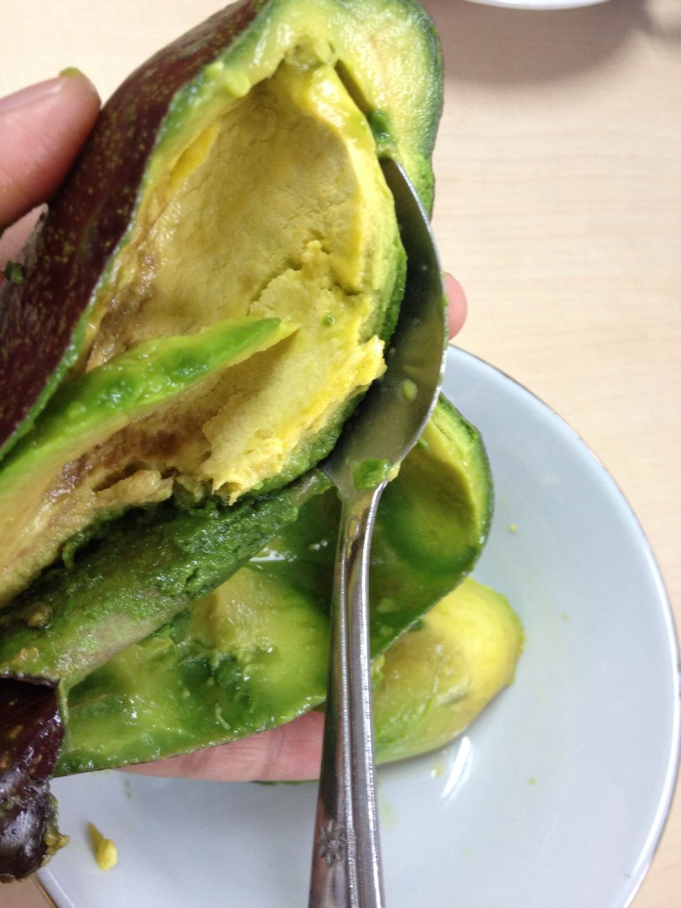 Spoon the avocado flesh