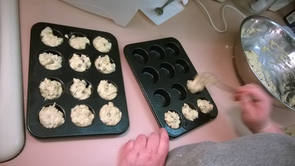 spoon the batter by heaping Teaspoons into prepared muffin holes.