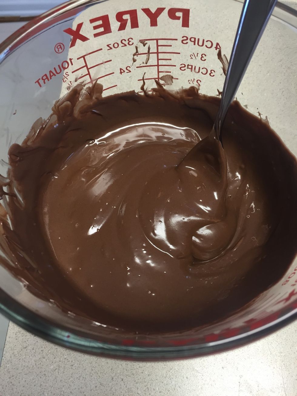 Spoon the chocolate onto the back of the cookies and put them chocolate side down on wax paper and into the fridge for 15 minutes