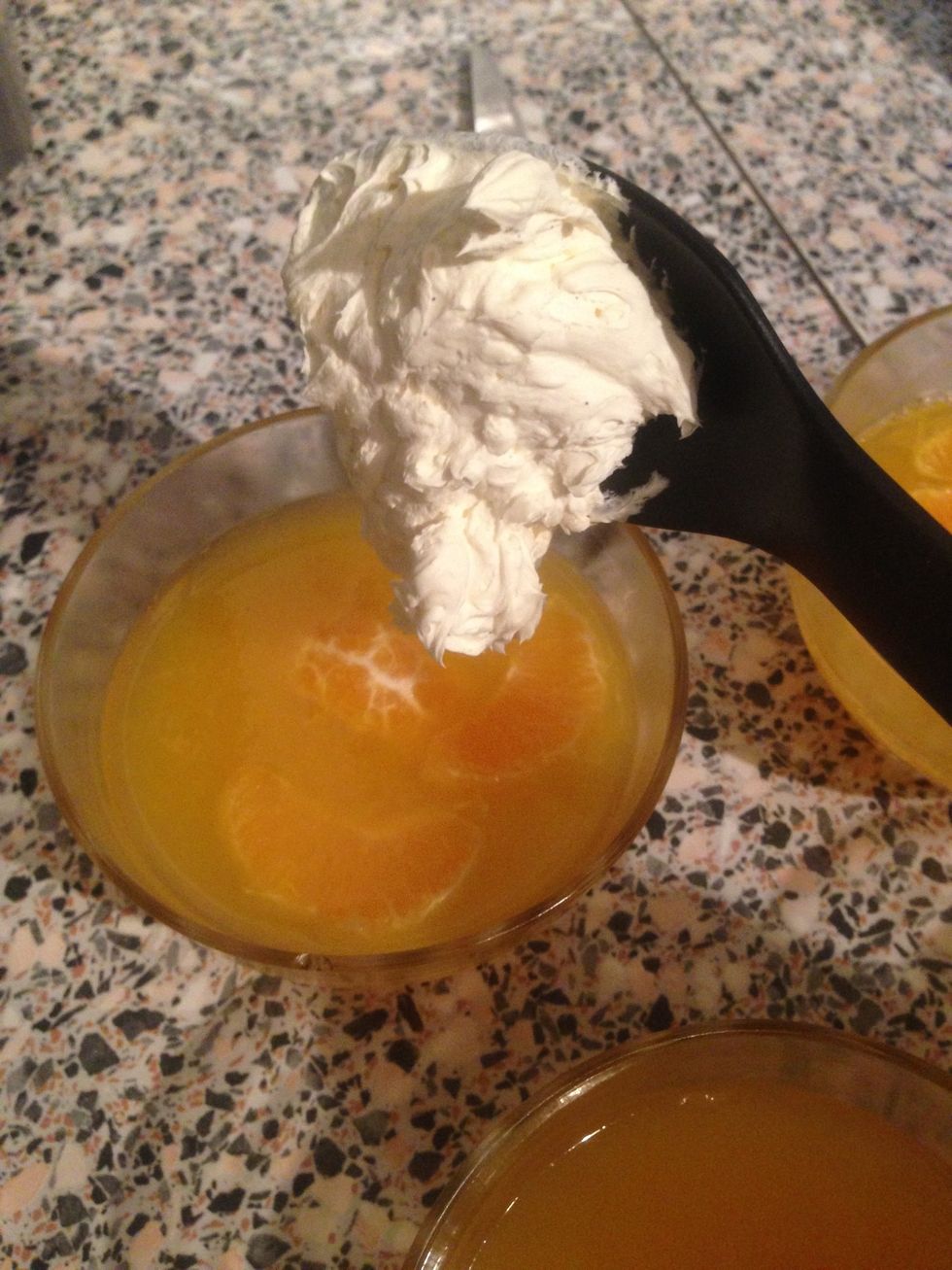 Spoon the cream into the bowls.