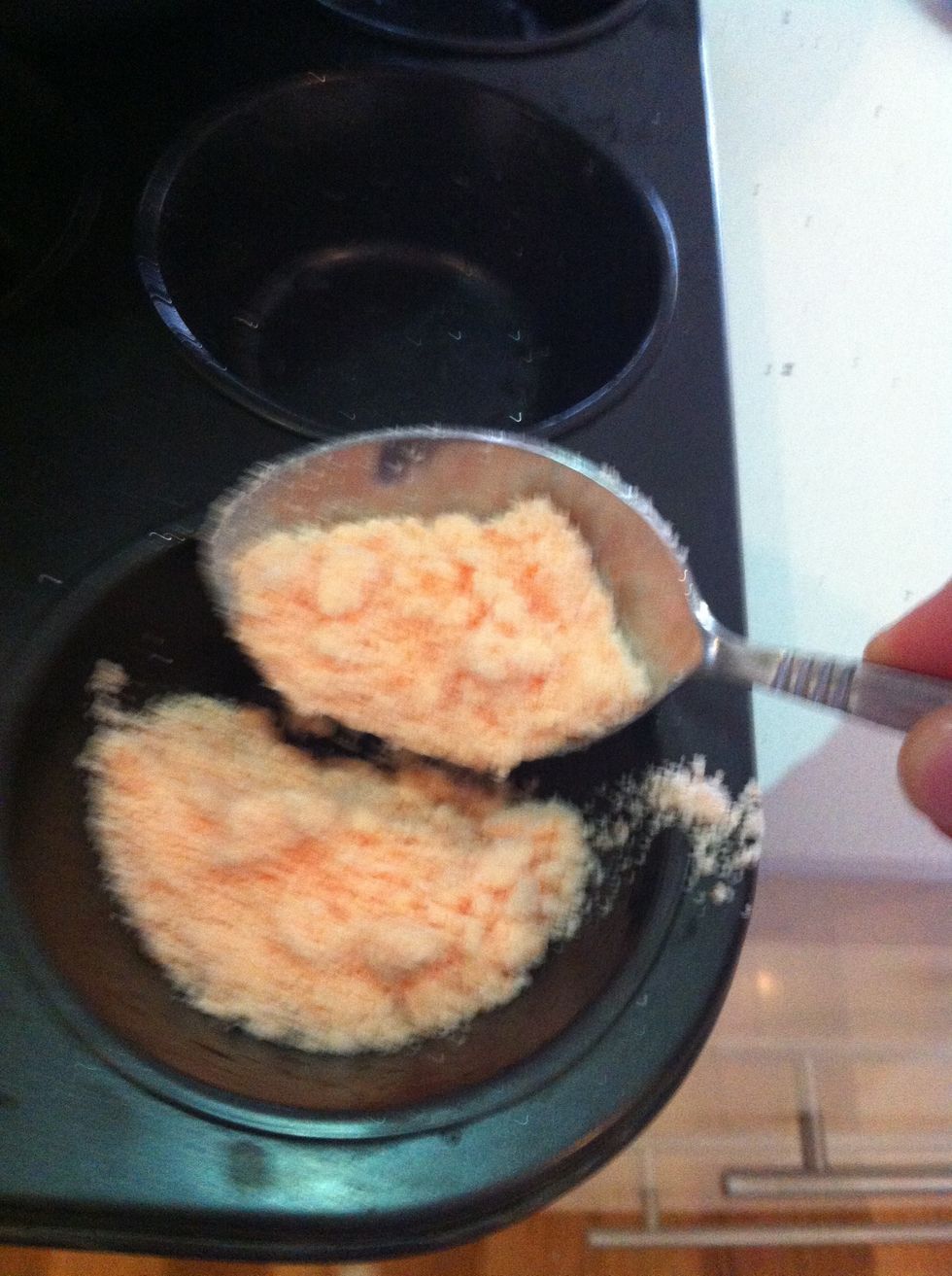 Spoon the mixture into the trays.