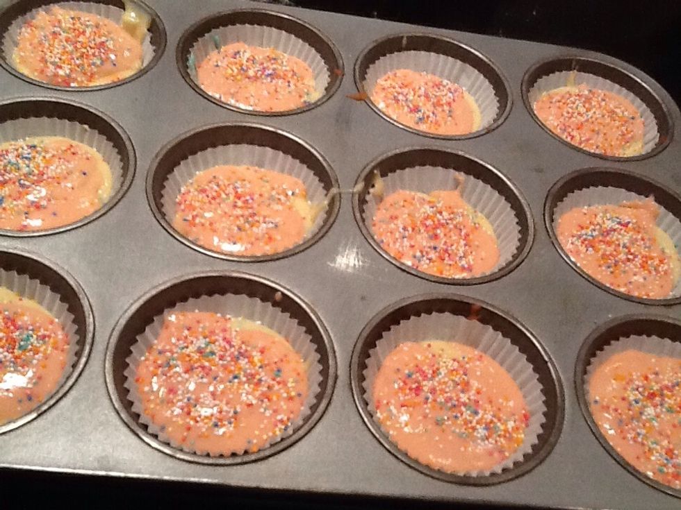 Spoon the mixture into your cupcake tray and add your favourite toppings.