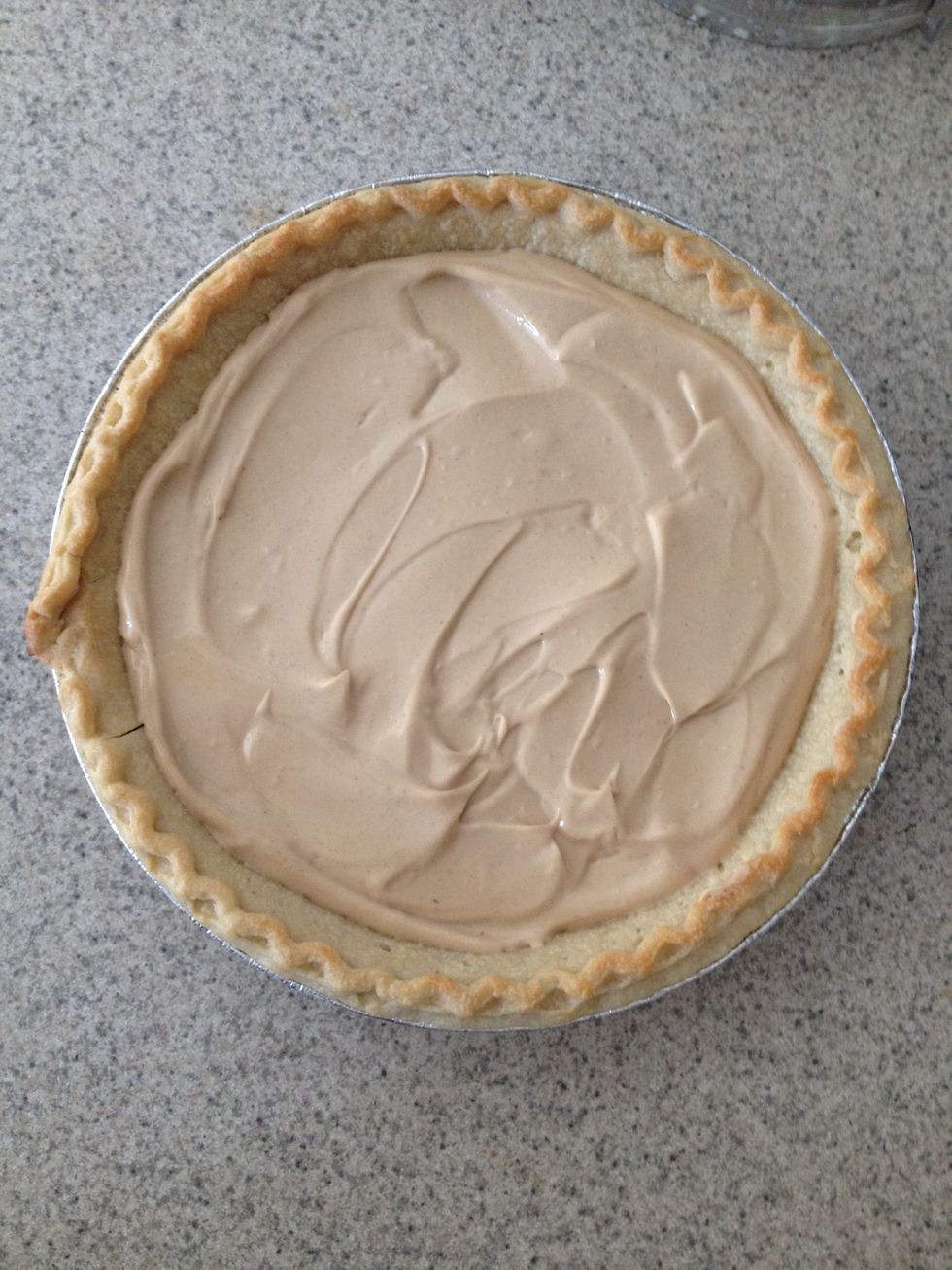 Spoon the peanut butter mixture onto the already baked pie crust. Smooth it out with a spatula or spoon.