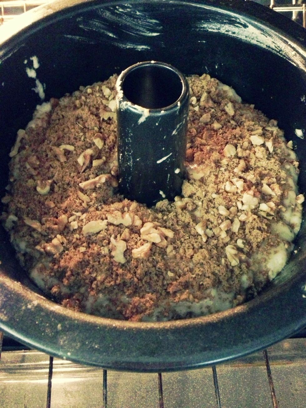 Spoon the remaining half of the batter on top of the first layer followed by the remaining sugar mixture set on top. Bake for 55 minutes or until a toothpick inserted in the middle comes out clean.