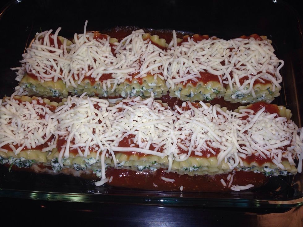 Spoon the rest of the sauce over the roll ups, and sprinkle with mozzarella cheese. Cover with foil, and bake for 40 minutes, or until cheese is completely melted.