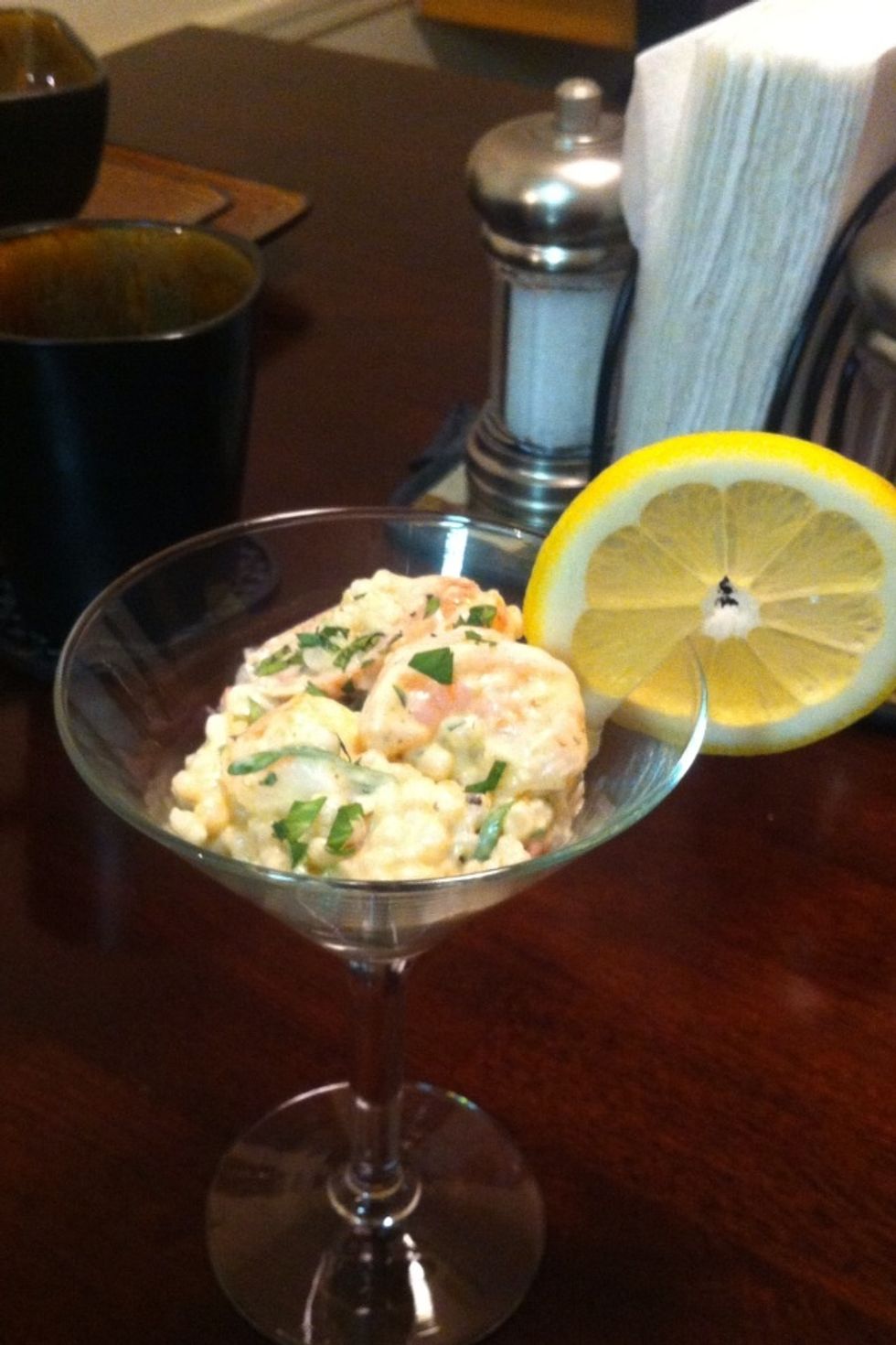 Spoon your mixture into a martini glass and garnish with slice of lemon. And serve. You can also sprinkle some chopped parsley over the top.