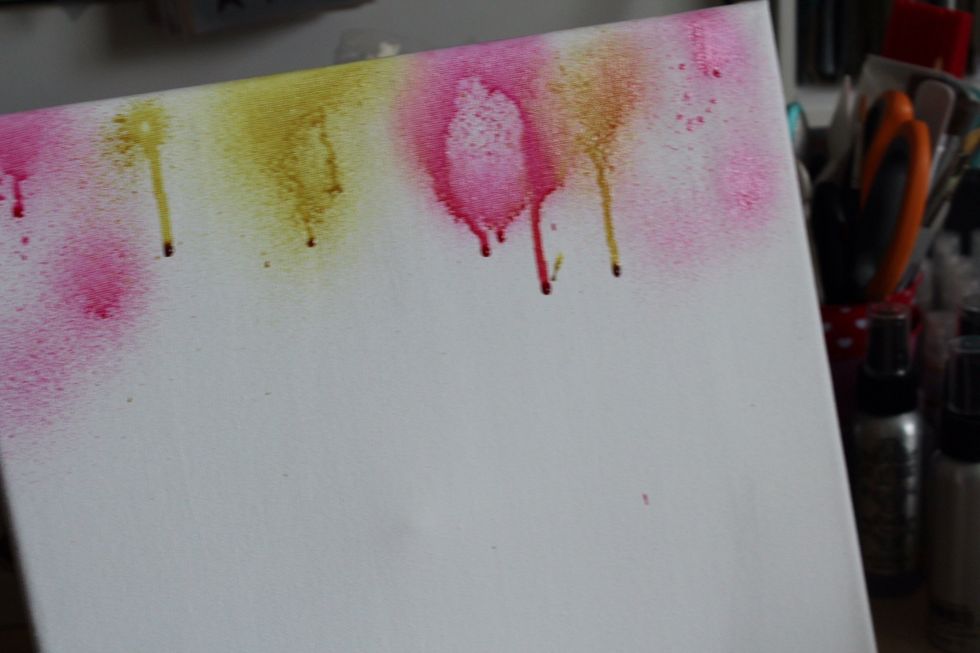 Sprat mists on a pre-gesso'd canvas. I used Art Anthology Colorations ink sprays.