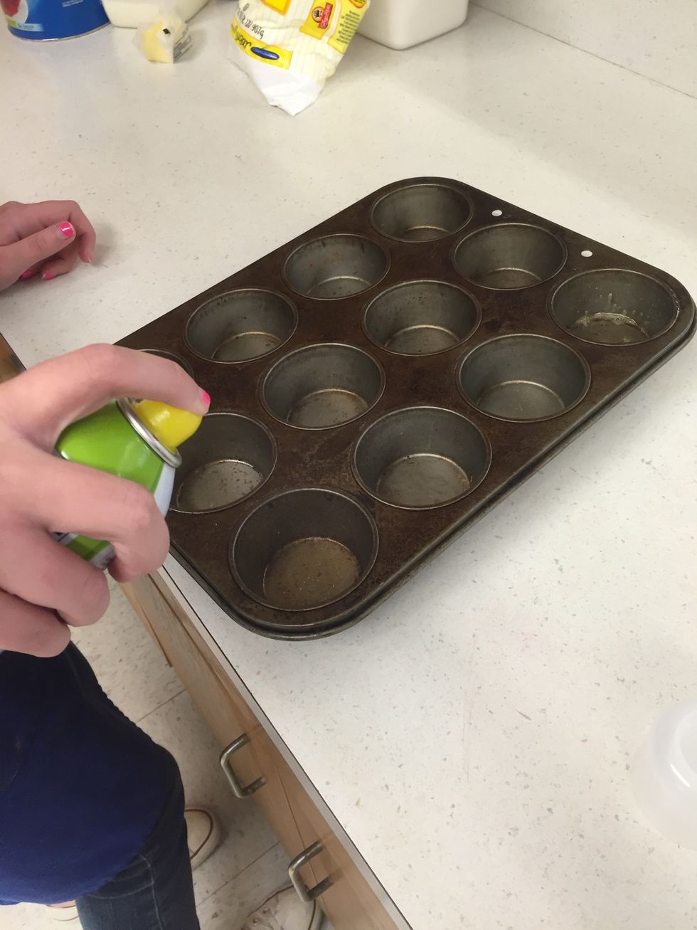 Spray 12 muffin cups with PAM