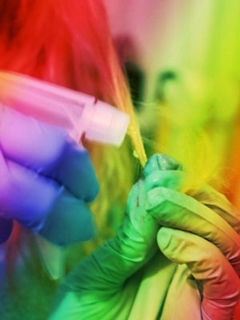 Spray a 1-inch section of hair with water. You don't need to soak the entire strand, just go as high up as you want the color to be.