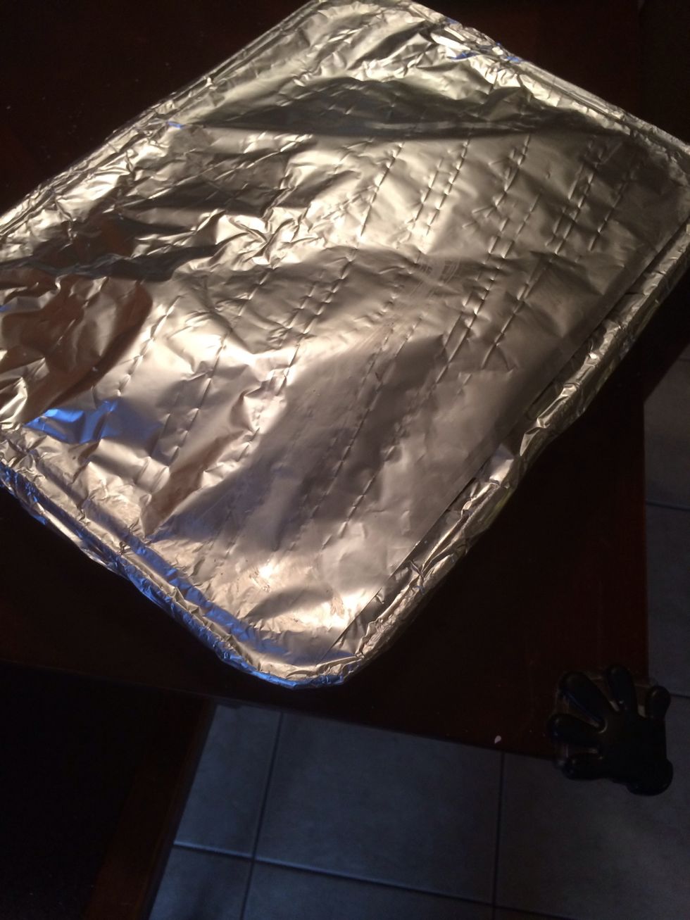 Spray a piece of aluminum foil with cooking oil and cover the lasagna being careful that the foil doesn't touch the cheese. At this point you can either freeze this lasagna or bake it.