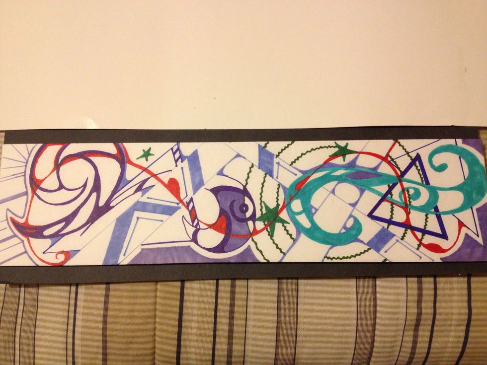 Spray adhesive on white board and place right on center of black board and you're done. Now you can choose to leave as is or place it in a frame. It's your art!