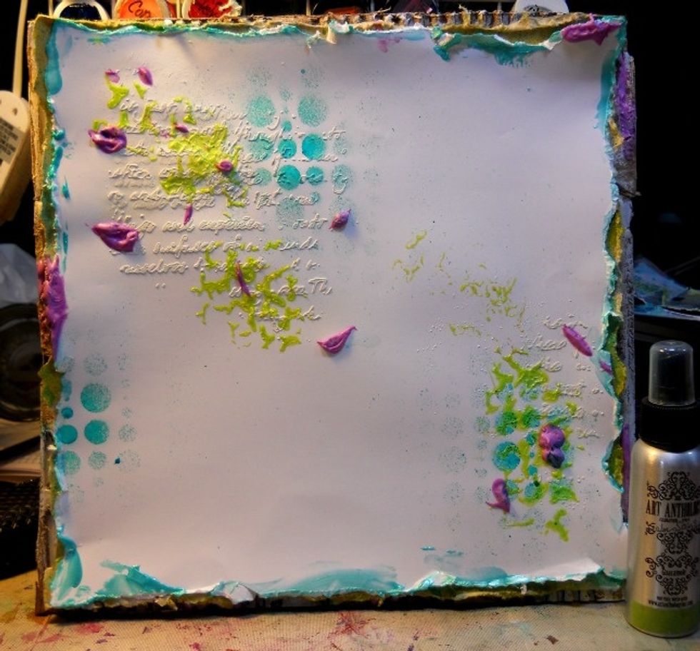 Spray Art anthology colorations through a art anthology stencil.