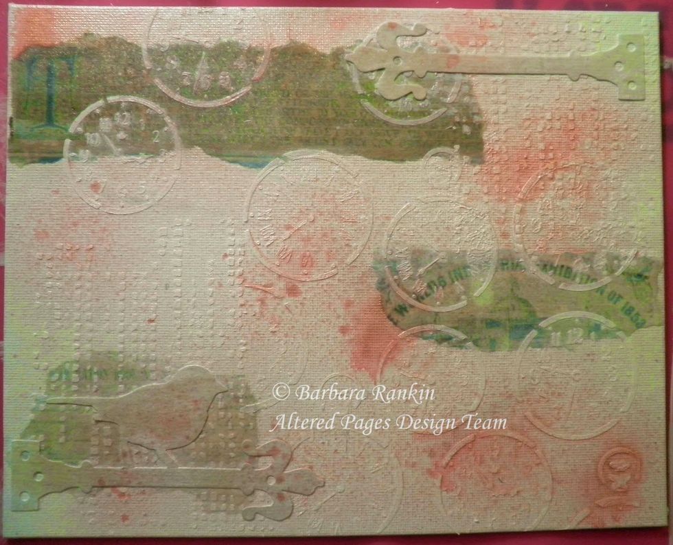 Spray background with Cherub Pink, let dry. The next series of pictures show the metamorphic changes to this canvas as it progresses. Mixed media allows you to just keep adding until you like it.