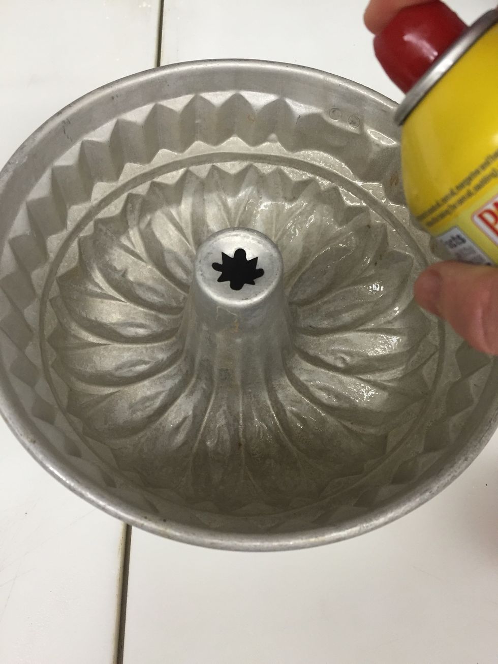 Spray bundt pan generously with pam spray.
