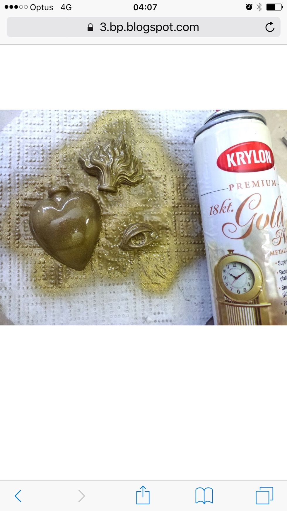 Spray cast resin heart and flame with gold spray paint.
